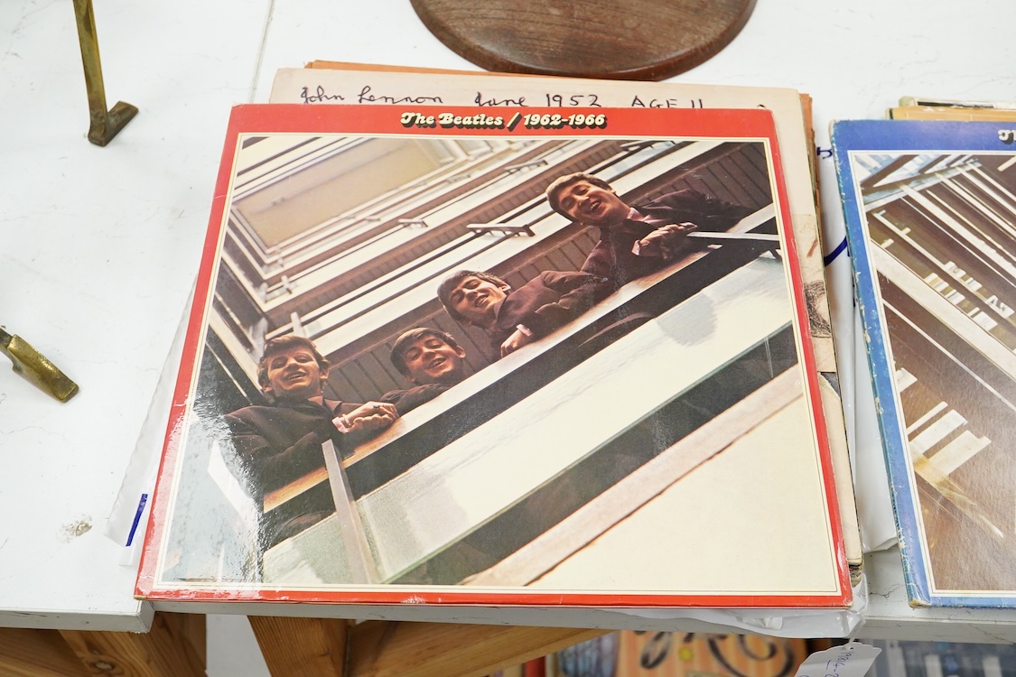 Fourteen The Beatles related LP record albums, including; Rubber Soul, The Beatles at the Hollywood Bowl, With The Beatles, Beatles For Sale, Sgt. Pepper, Revolver, McCartney II, Wings Over America, the Concert for Bangl